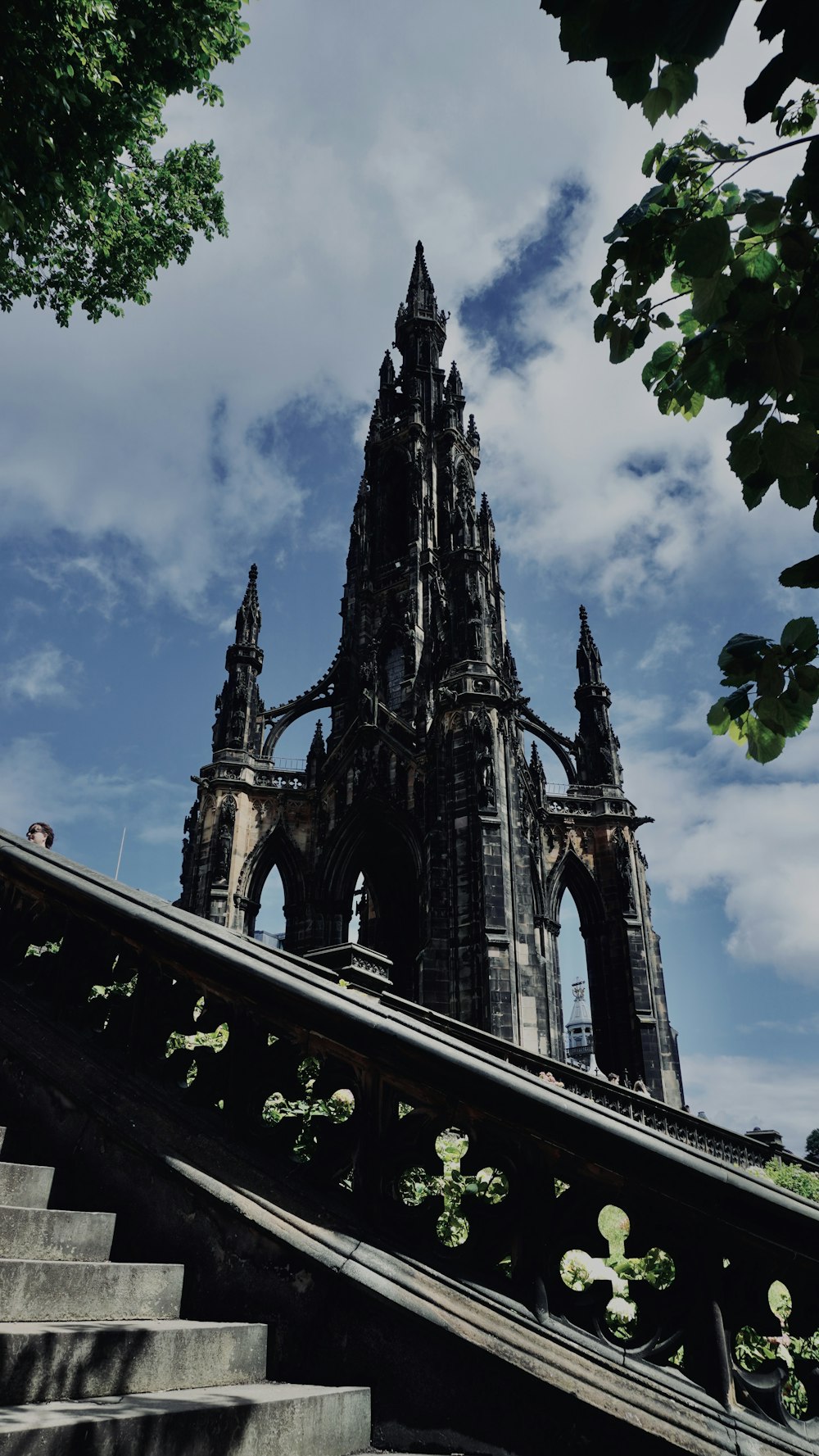 a very tall building with a steeple on top of it