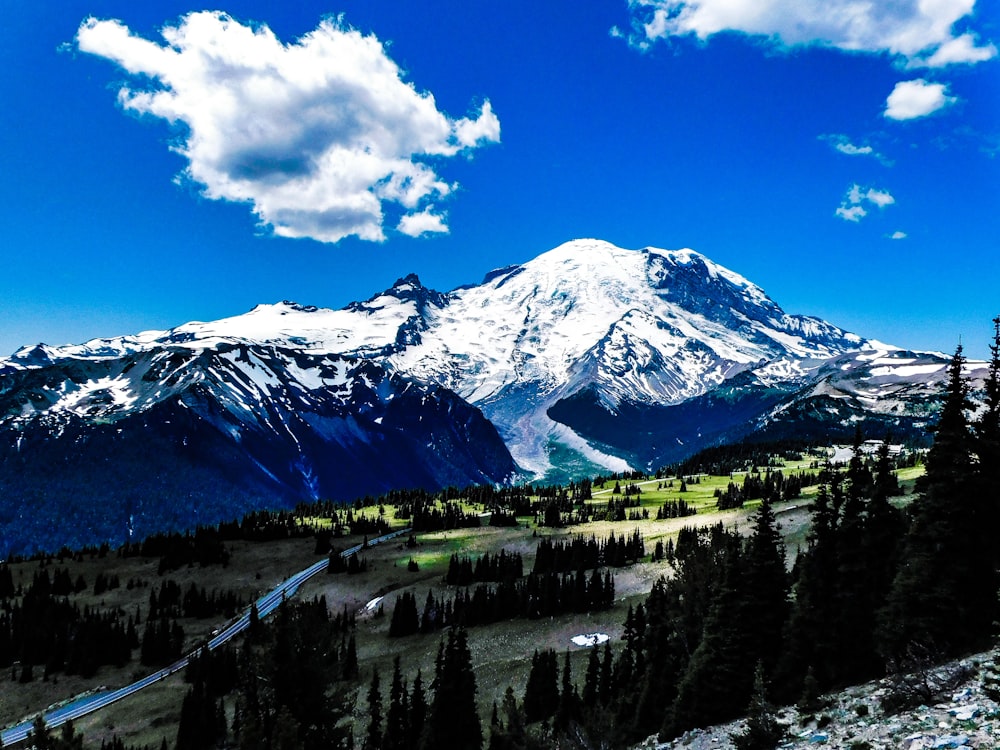 a view of a mountain with snow on it