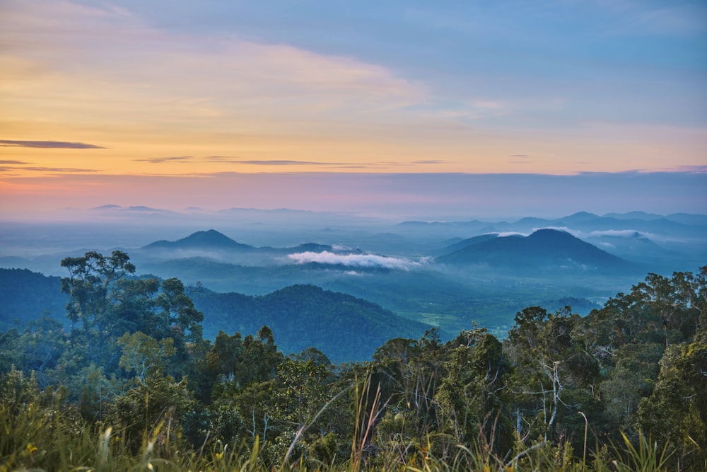 a view of a mountain range at sunset