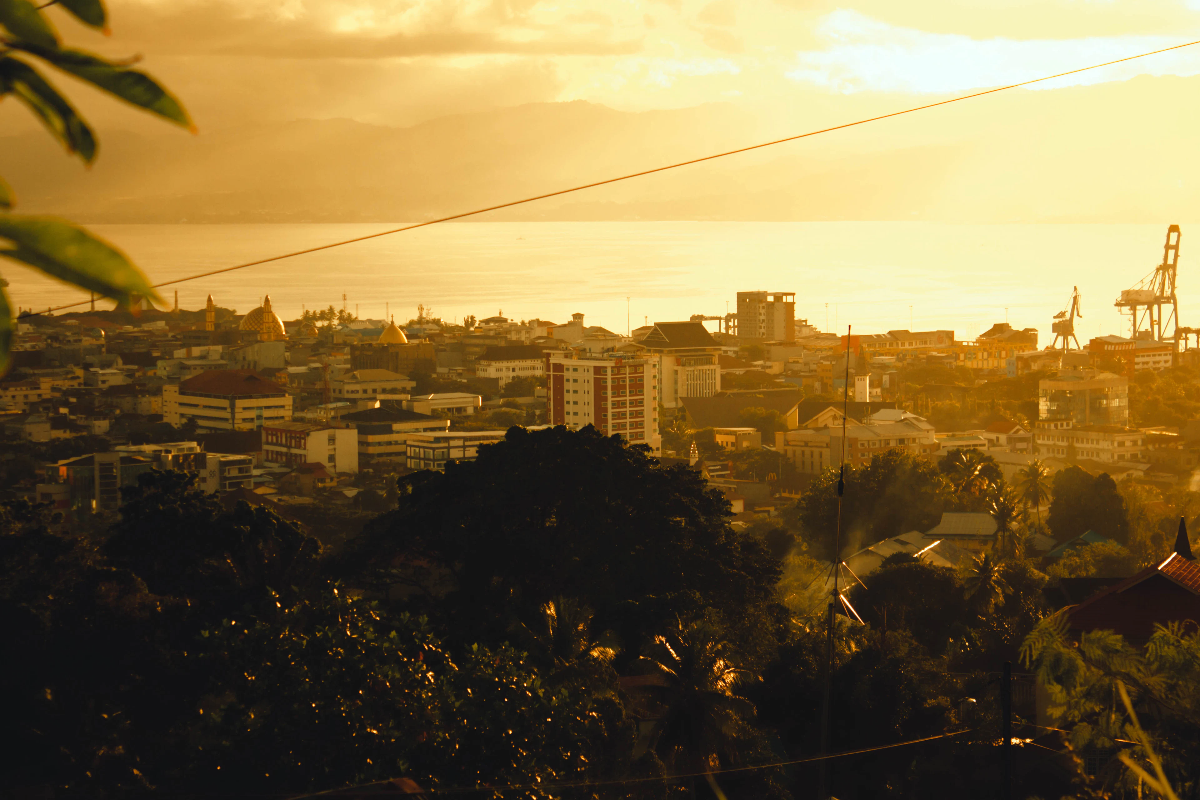 Ambon city and its bay in golden light before sunset