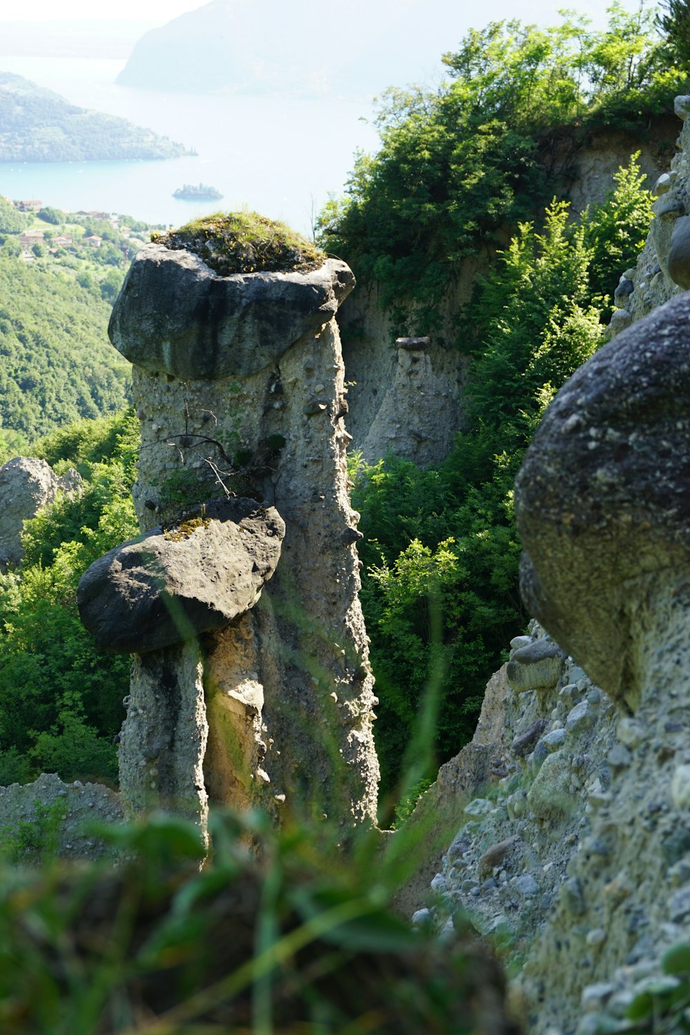 a view of a rocky outcropping with a body of water in the