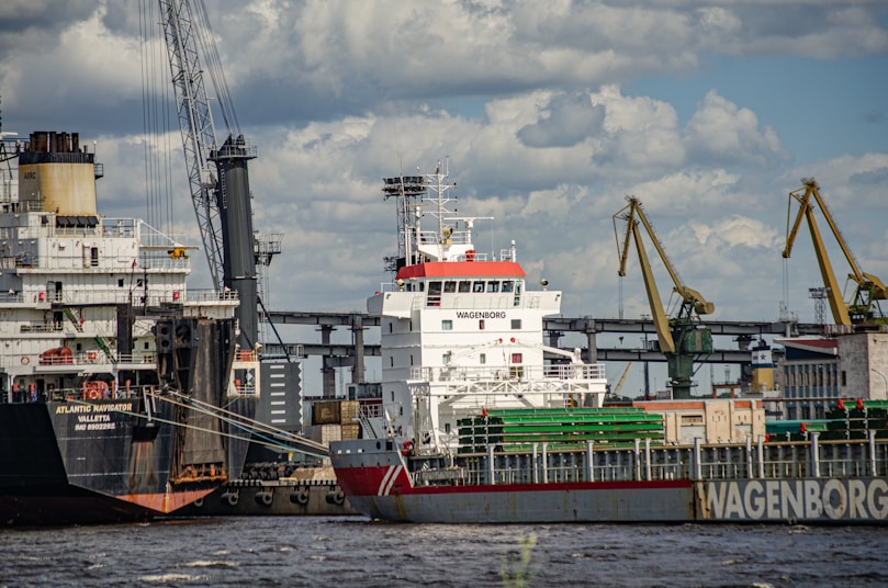a large boat is docked in a harbor