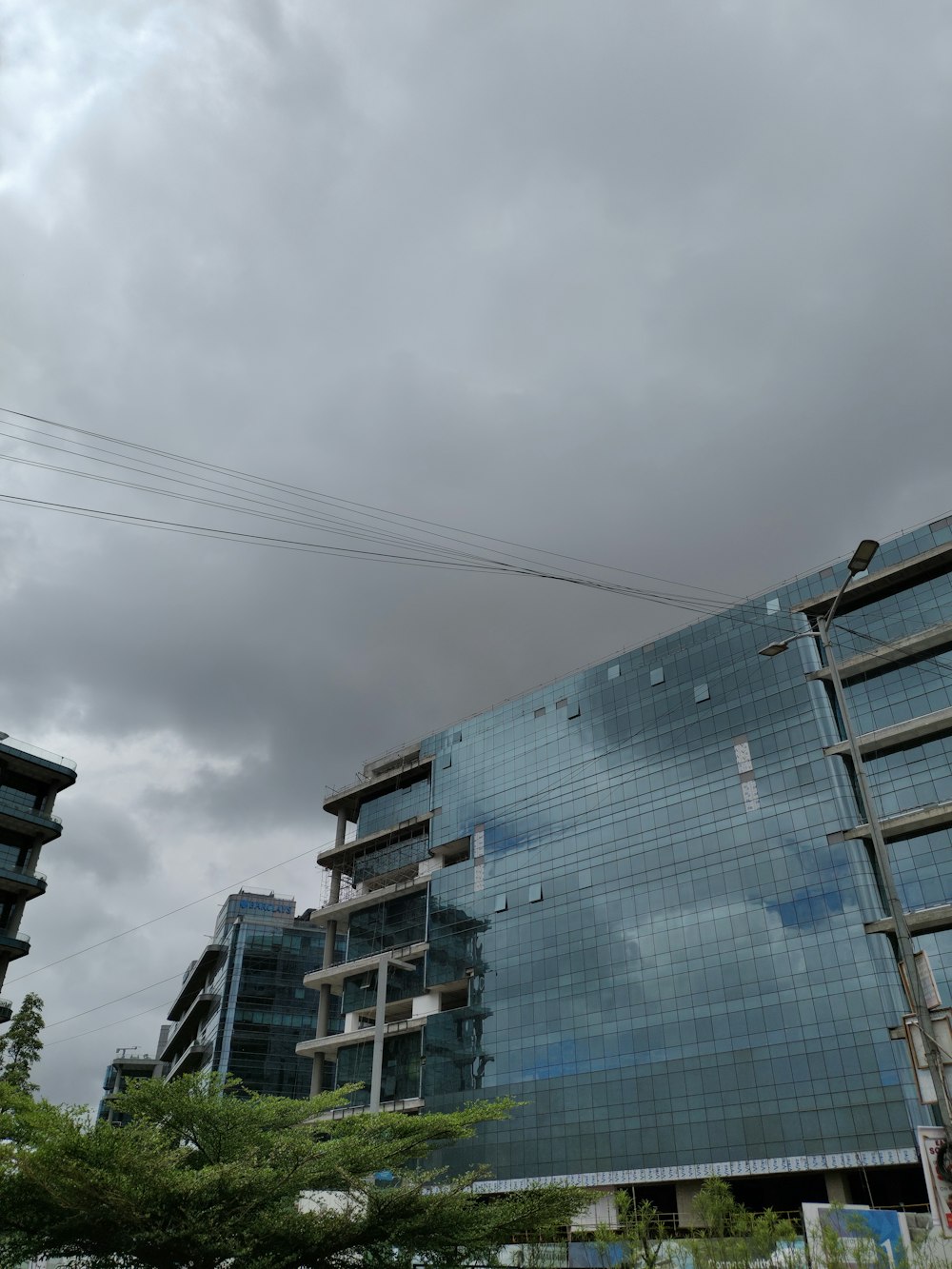 a tall building with a sky background