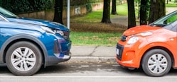 a couple of cars parked next to each other