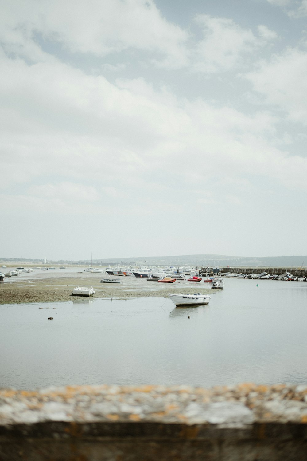 a body of water with a bunch of boats in it