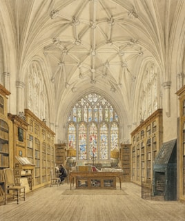 A quiet moment of a scholar reading a rare book in the center’s cozy library corner.