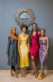 a group of women standing next to each other