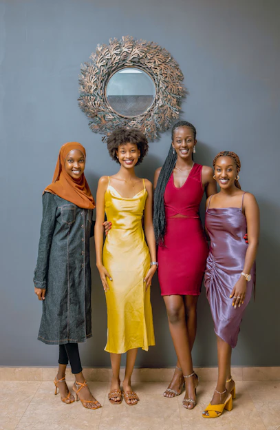 a group of women standing next to each other