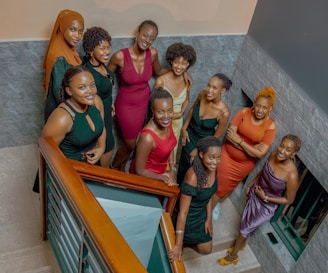 a group of women standing next to each other