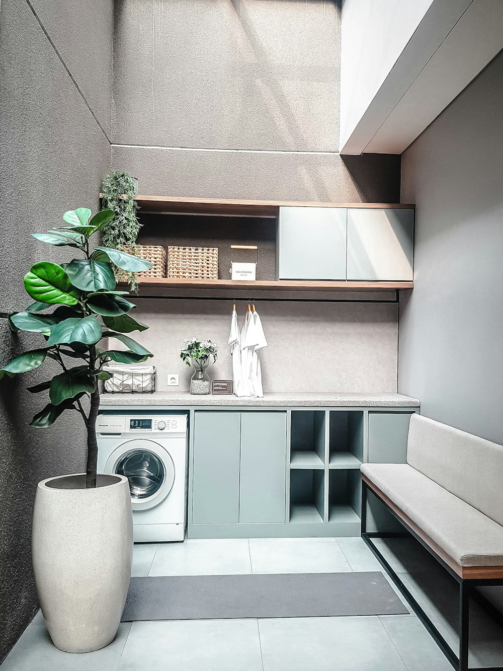 a washer and dryer in a small room