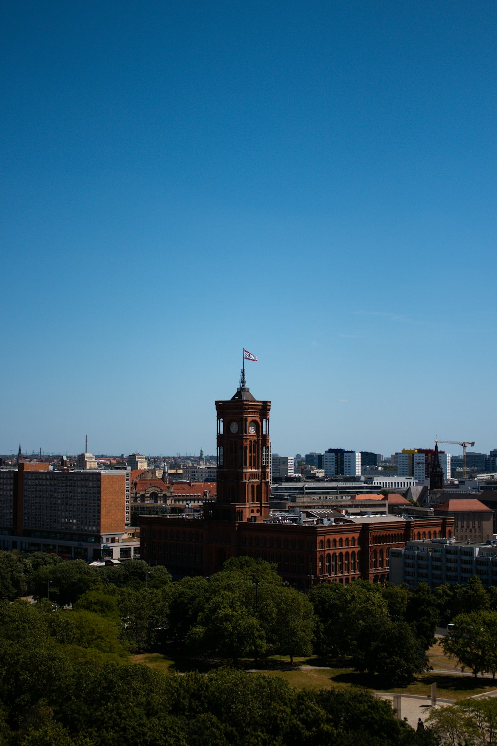 a tall clock tower towering over a city