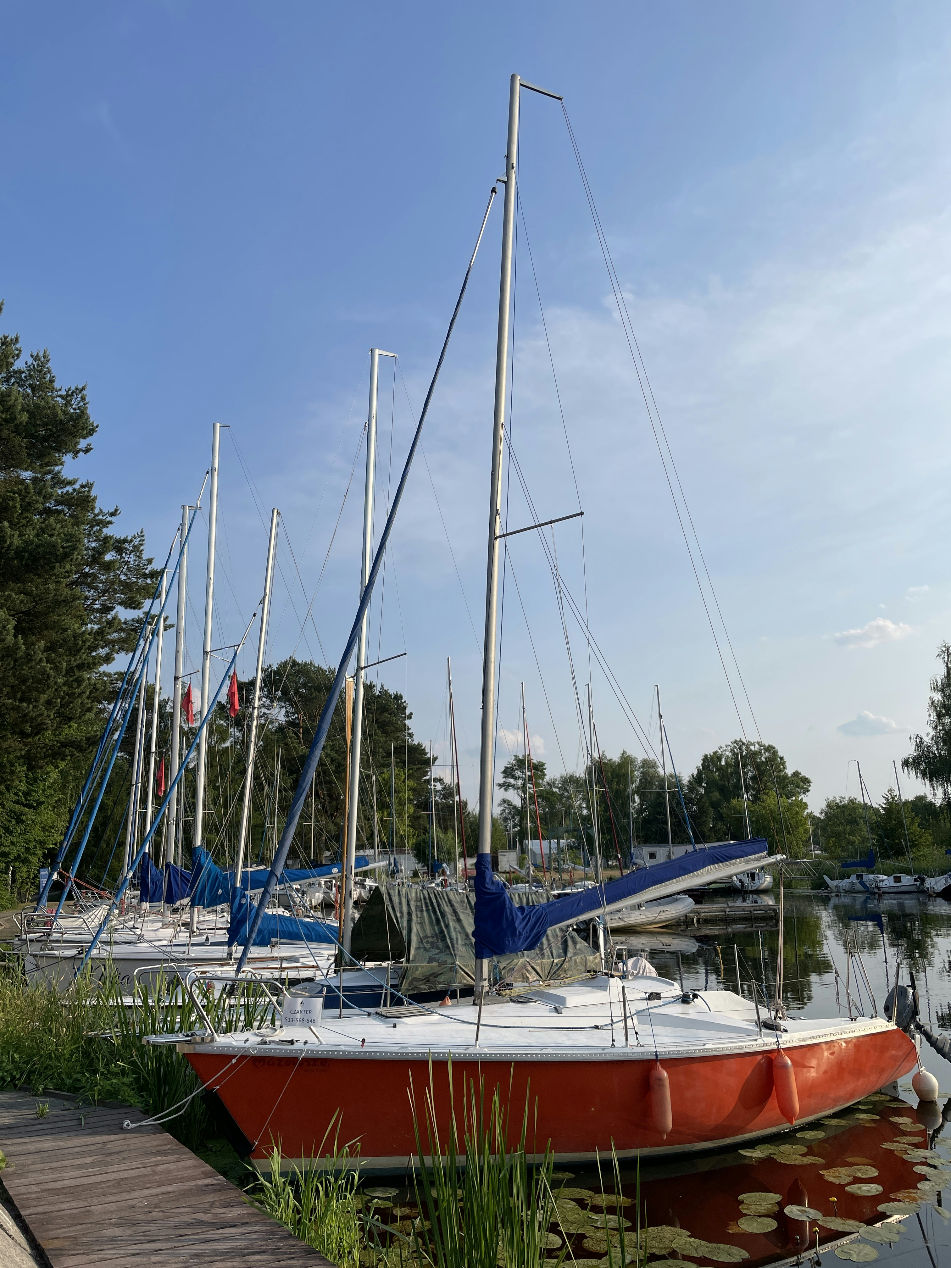 a bunch of boats that are sitting in the water