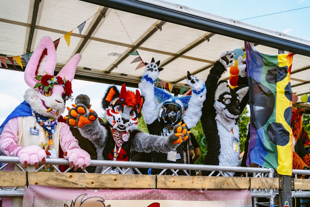 a group of people dressed in animal costumes