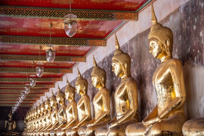 Golden-colored Siddha tablets arranged neatly with a soft glowing light highlighting their purity.