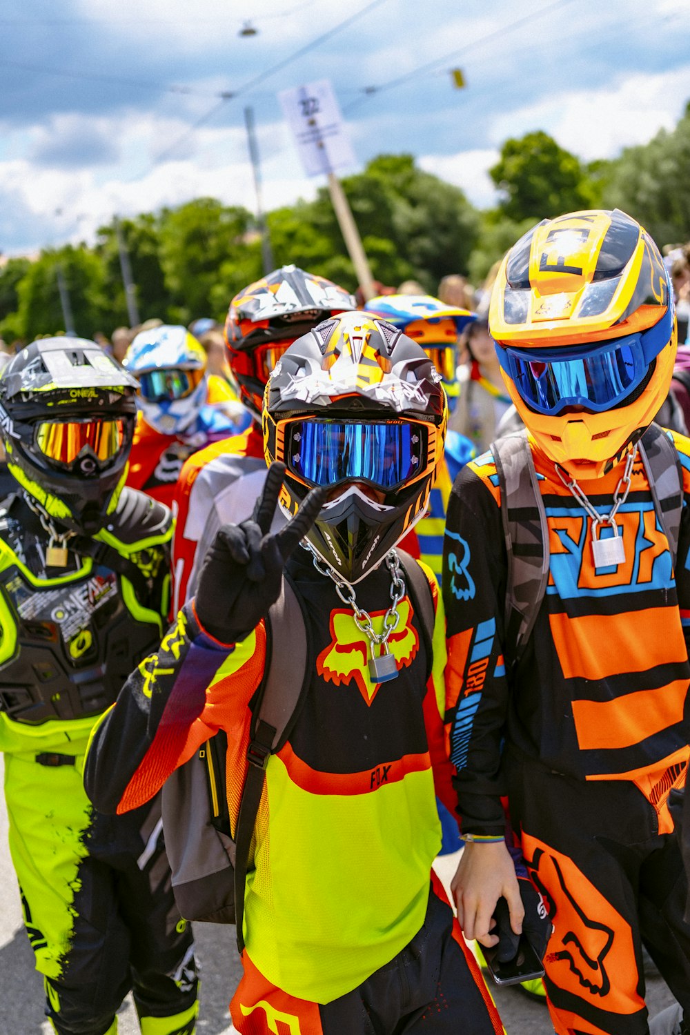 a group of people wearing helmets and protective gear