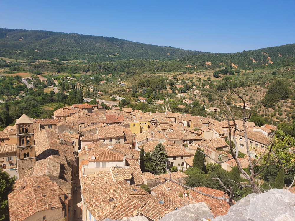 a view of a village in the mountains