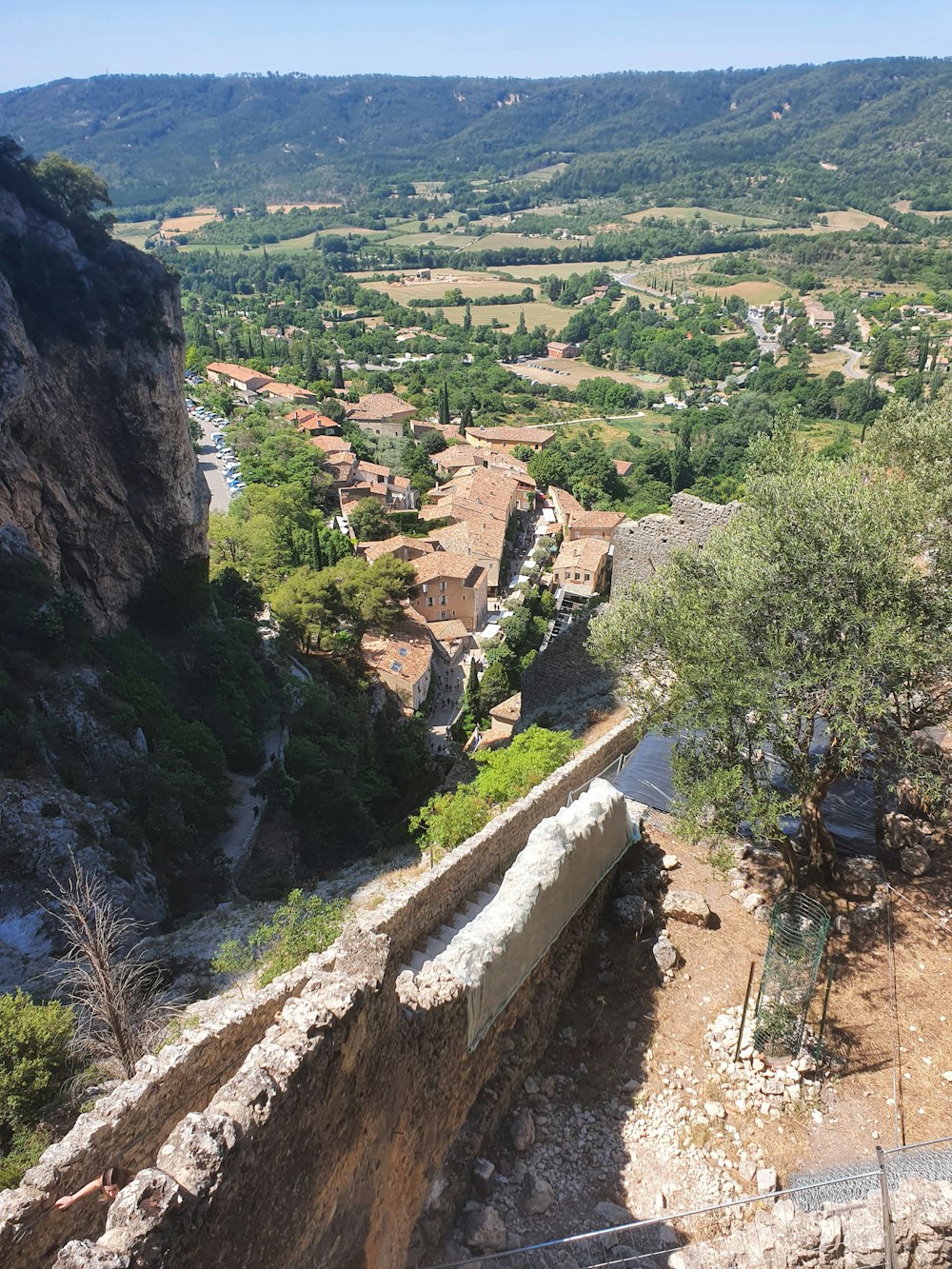 an aerial view of a village in the mountains