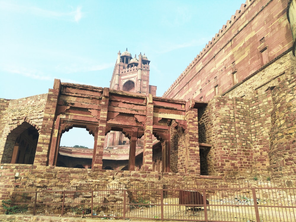 an old brick building with a clock tower