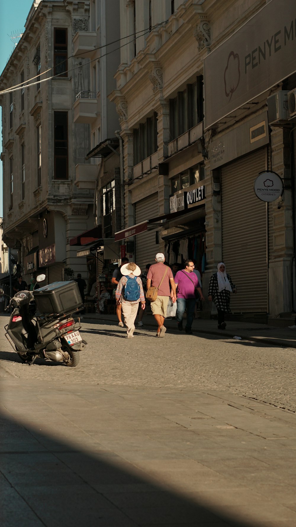 a motorcycle is parked on the side of the road