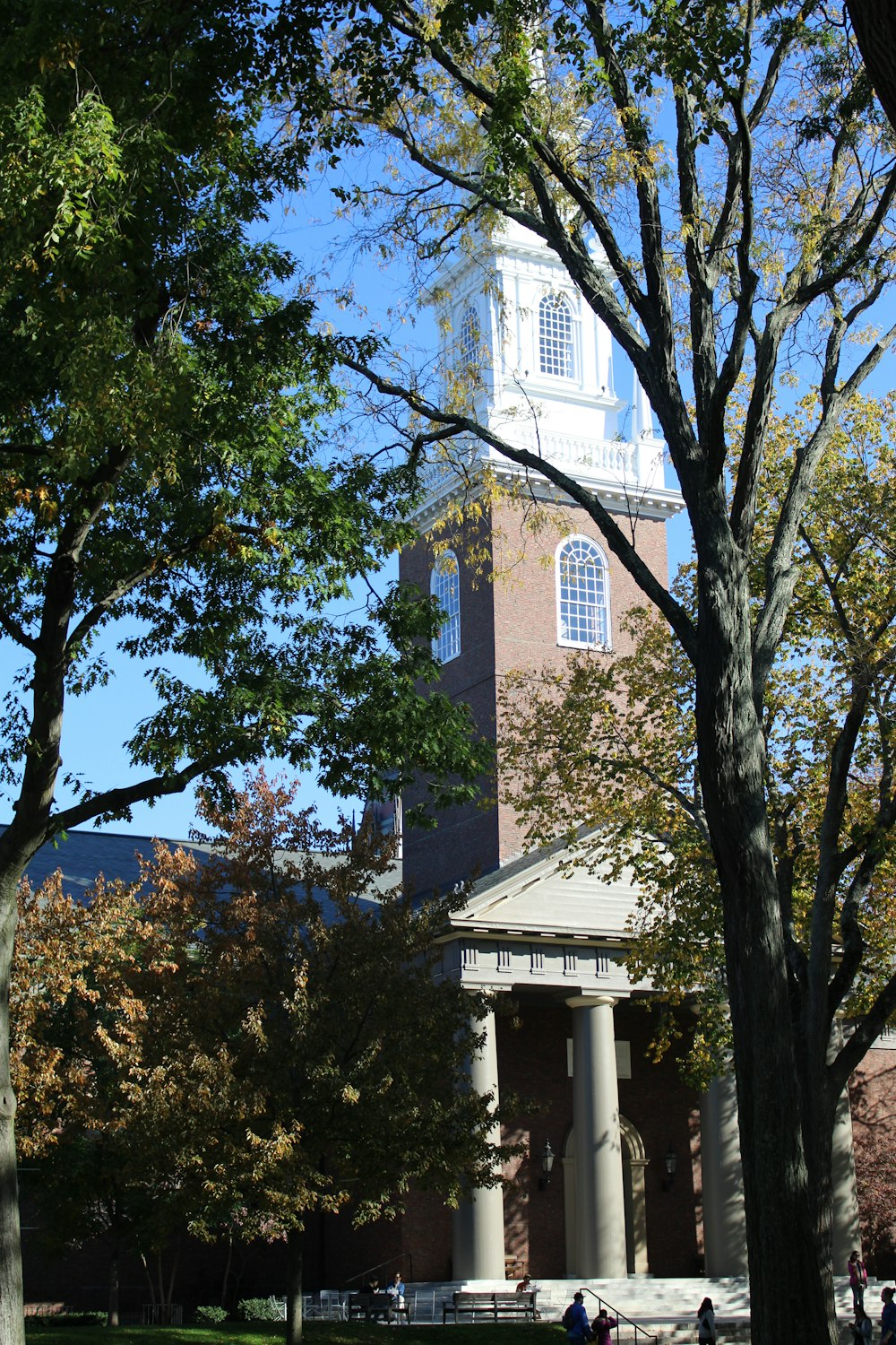 a tall building with a clock on the top of it