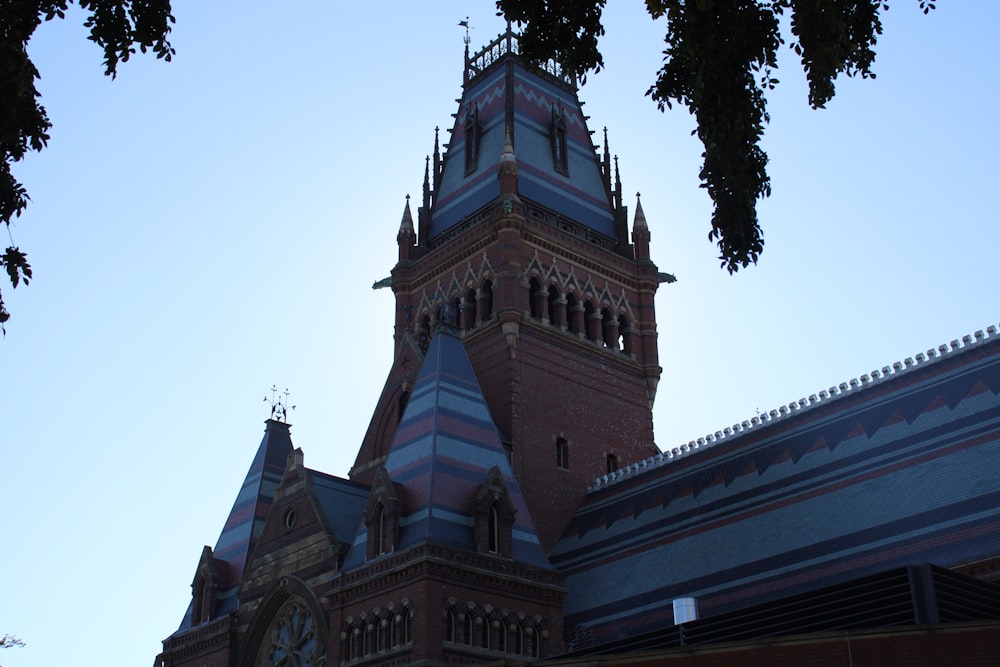 a tall building with a clock on the top of it