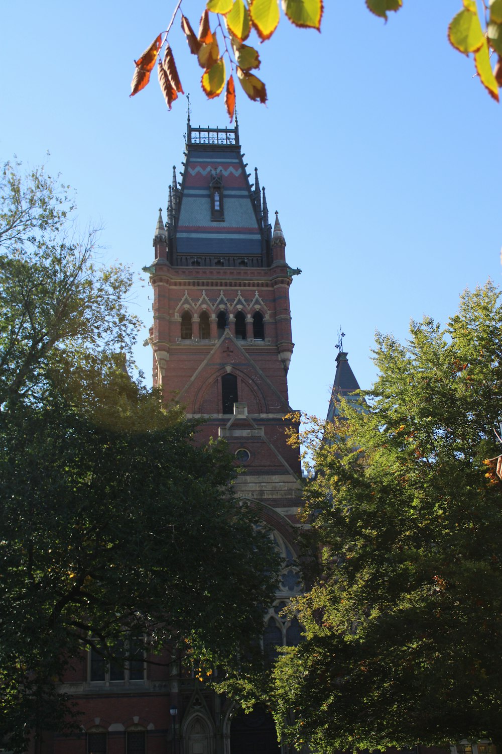 a tall tower with a clock on the top of it