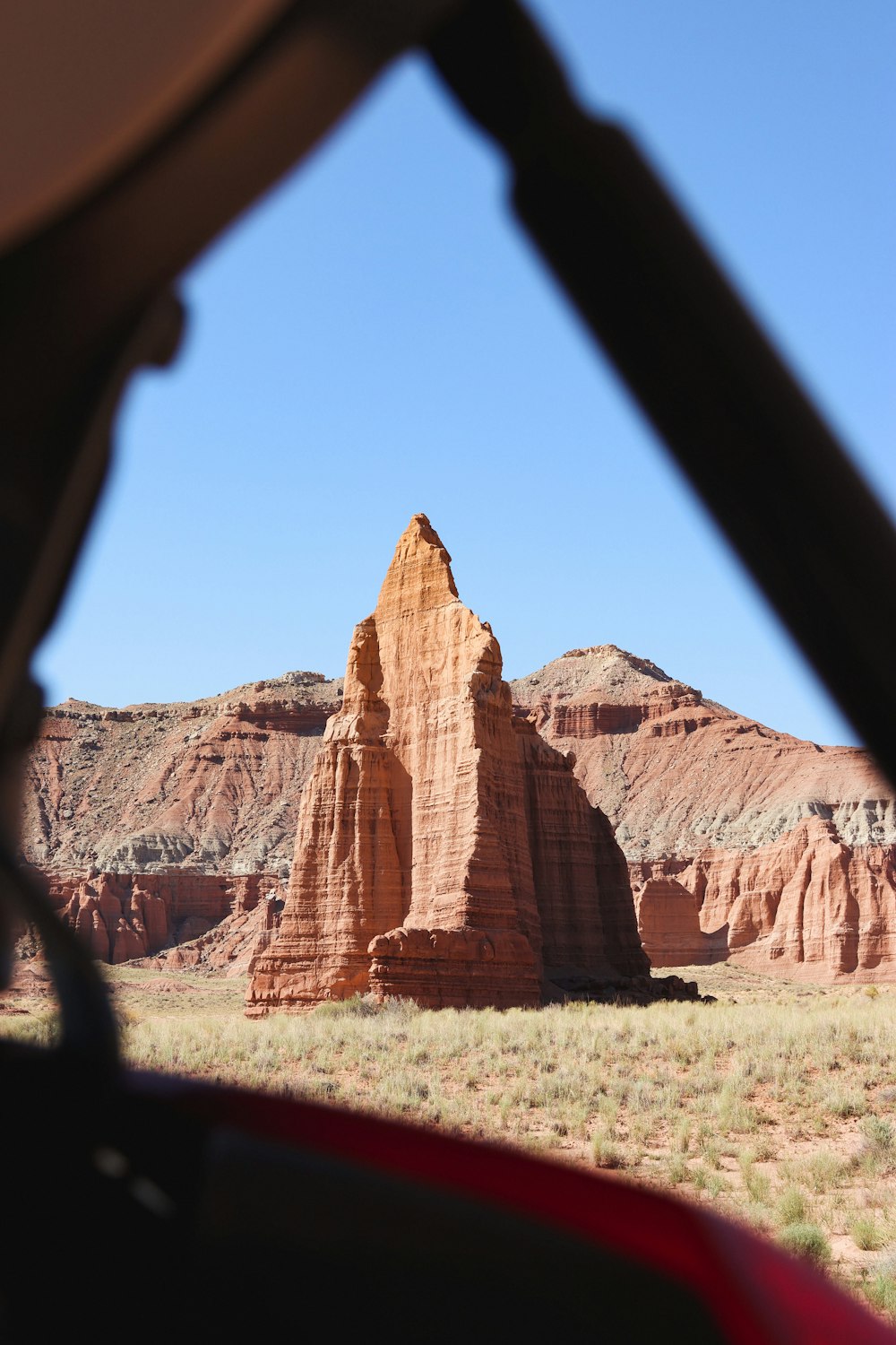 a view from inside a vehicle of a desert