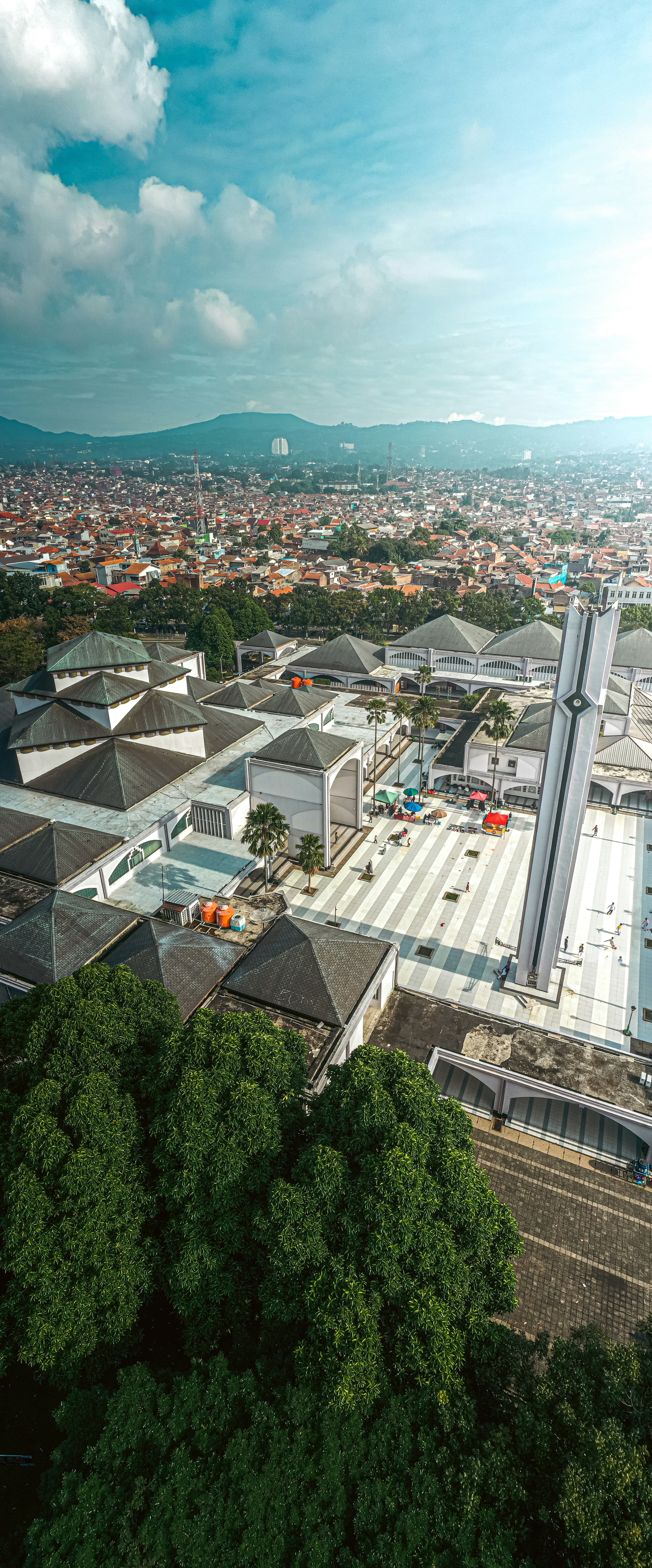 an aerial view of a city with many buildings