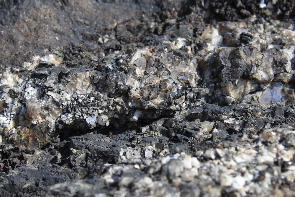 a close up of rocks and dirt on a sunny day