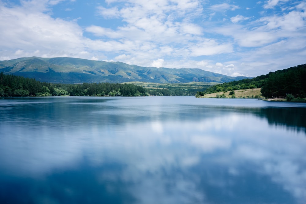 a large body of water surrounded by mountains