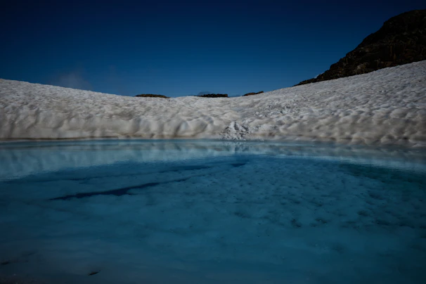 A serene, icy landscape reflecting the crisp, clean character of hiems vodka.
