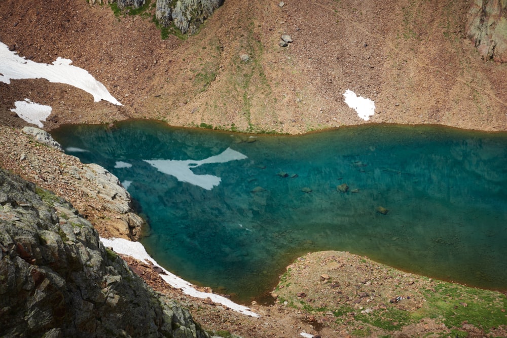 a large body of water surrounded by mountains