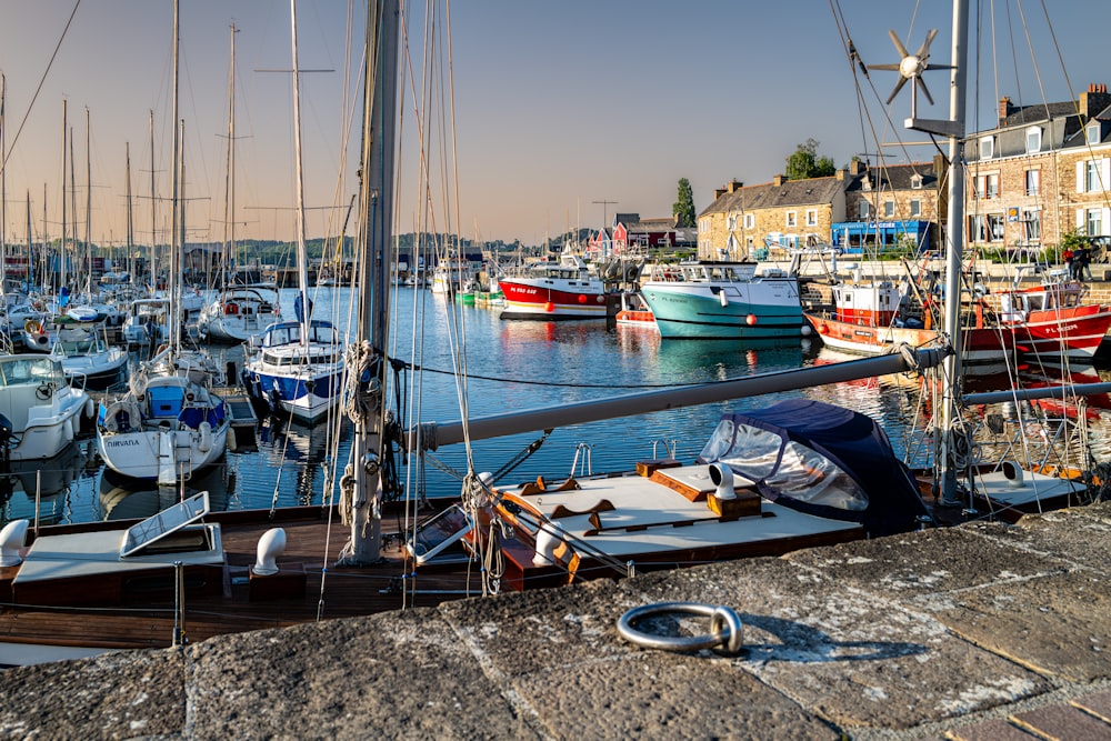 a harbor filled with lots of boats on top of water