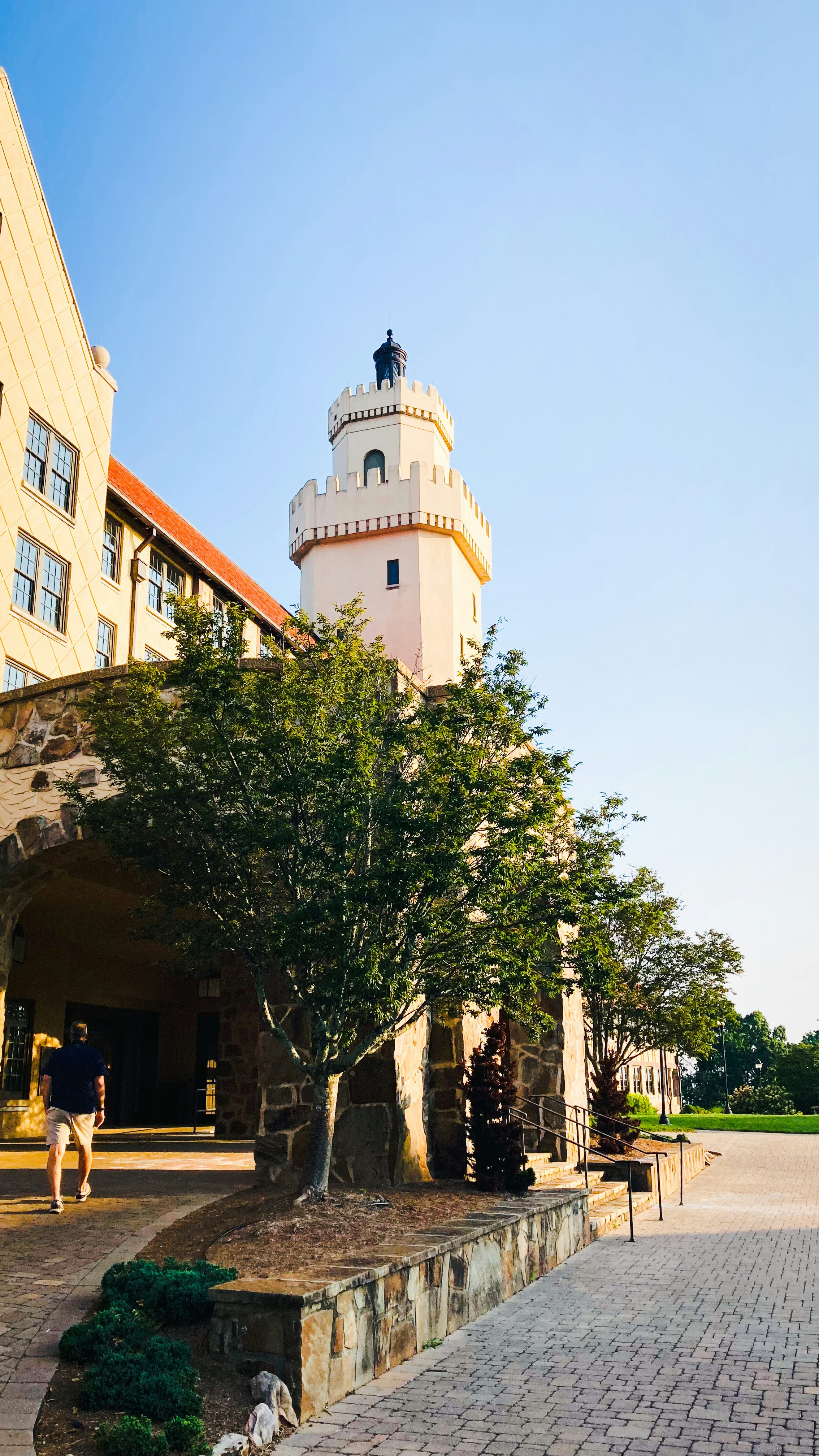 A building with a clock tower on top of it photo – Free Blue Image on ...