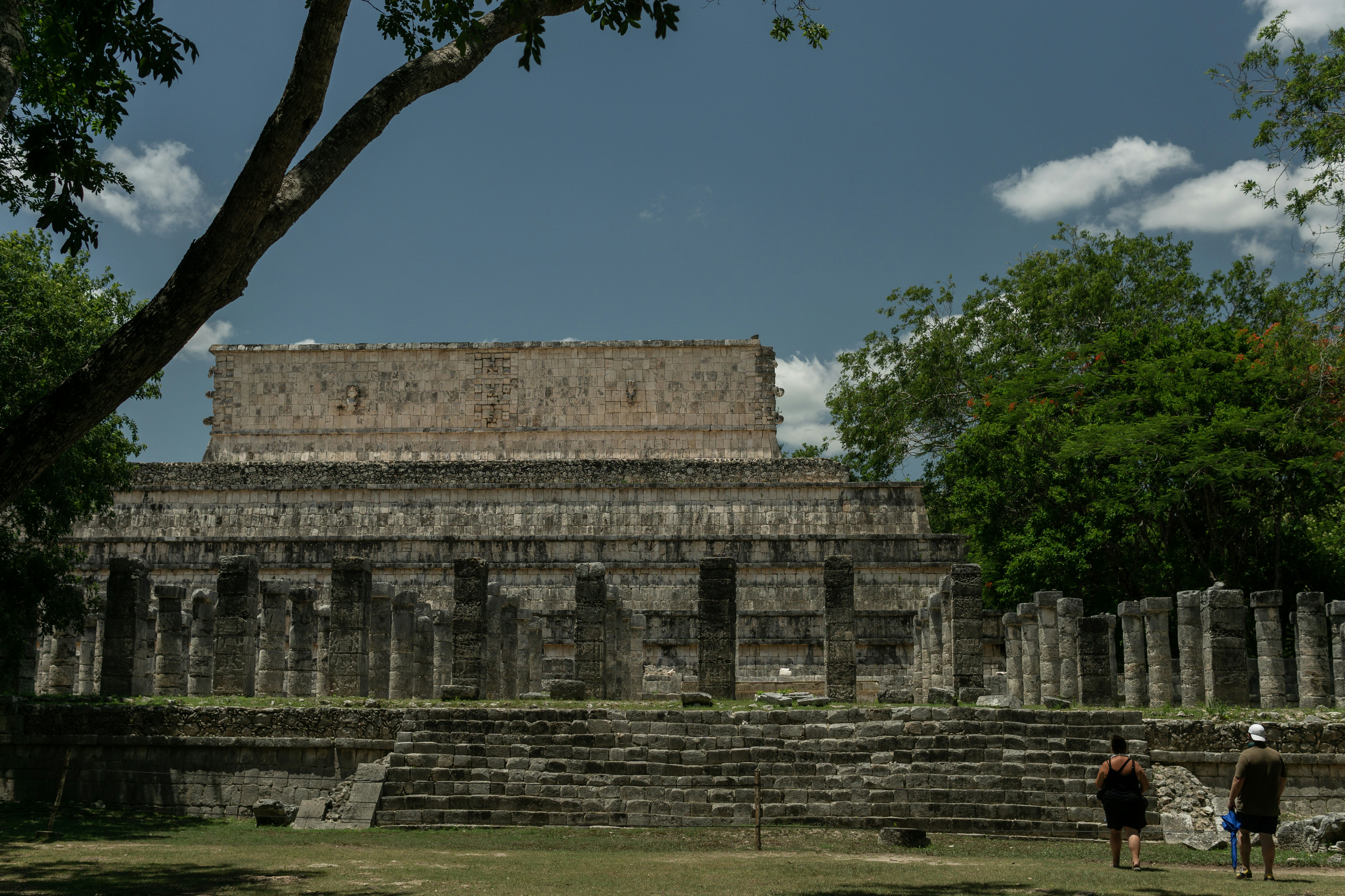 a group of people standing in front of a building