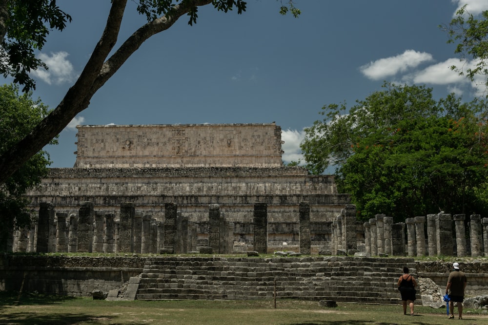 a group of people standing in front of a building