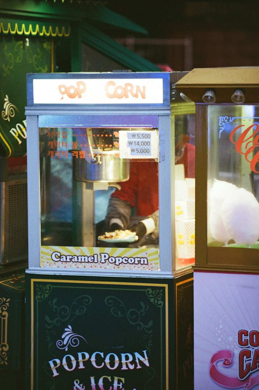 a popcorn machine sitting on top of a table