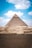 a large pyramid in the middle of a desert