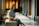 a woman sitting on a bench in a building