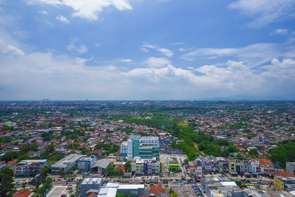 an aerial view of a city with lots of buildings