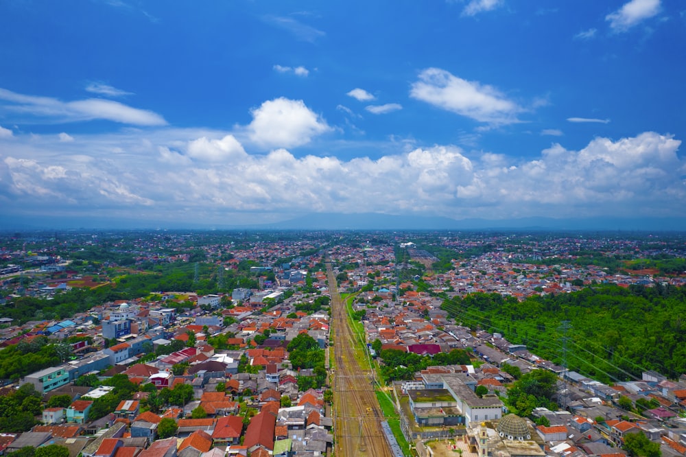 an aerial view of a city with lots of buildings