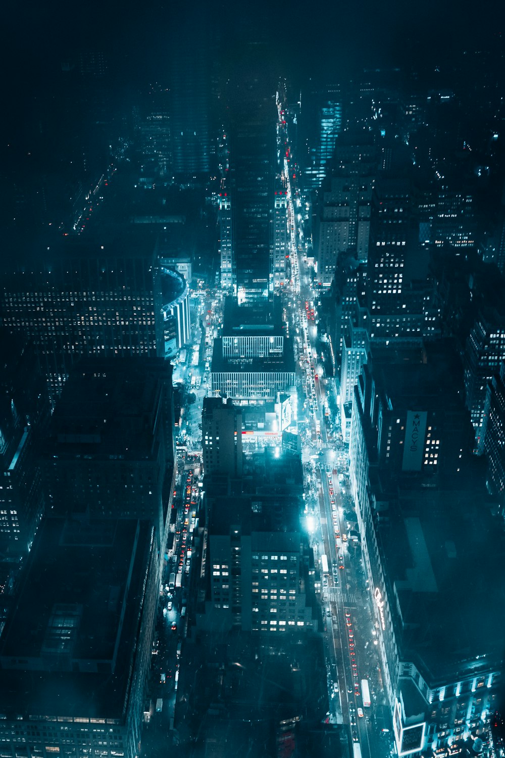 an aerial view of a city at night