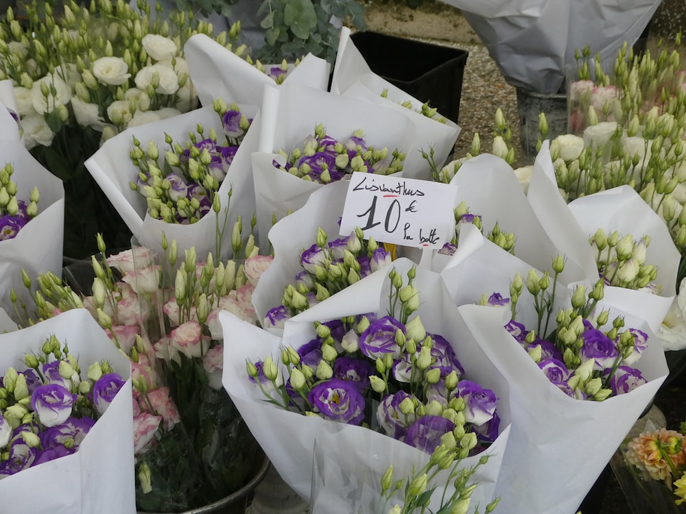 a bunch of flowers that are sitting in a vase