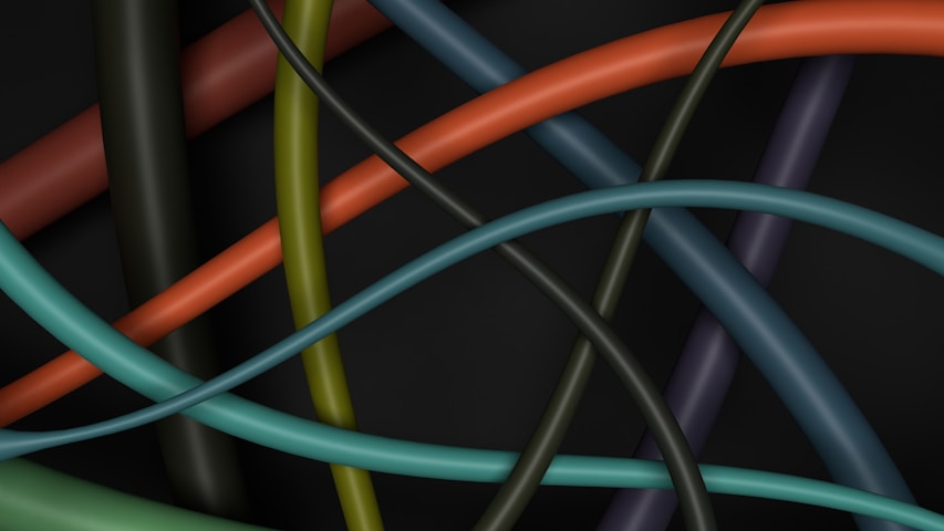 a close up of many different colored wires