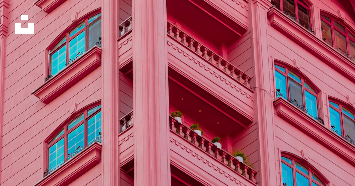 A tall pink building with balconies and balconies photo – Free Tehran ...