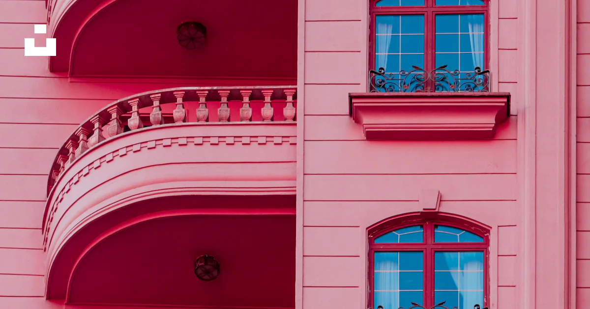 A tall pink building with balconies and balconies photo – Free Tehran ...