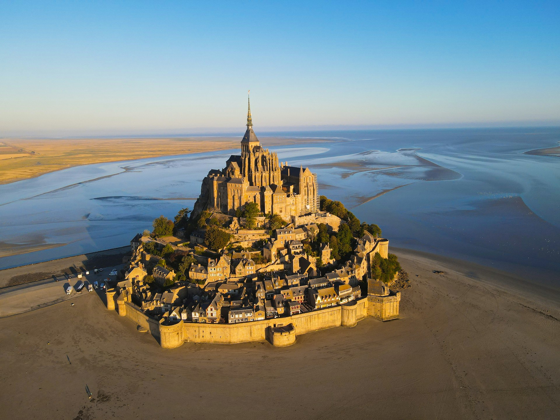 an island with a castle in the middle of it