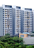 a group of tall buildings sitting next to each other
