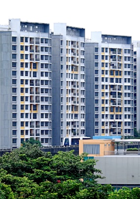 a group of tall buildings sitting next to each other