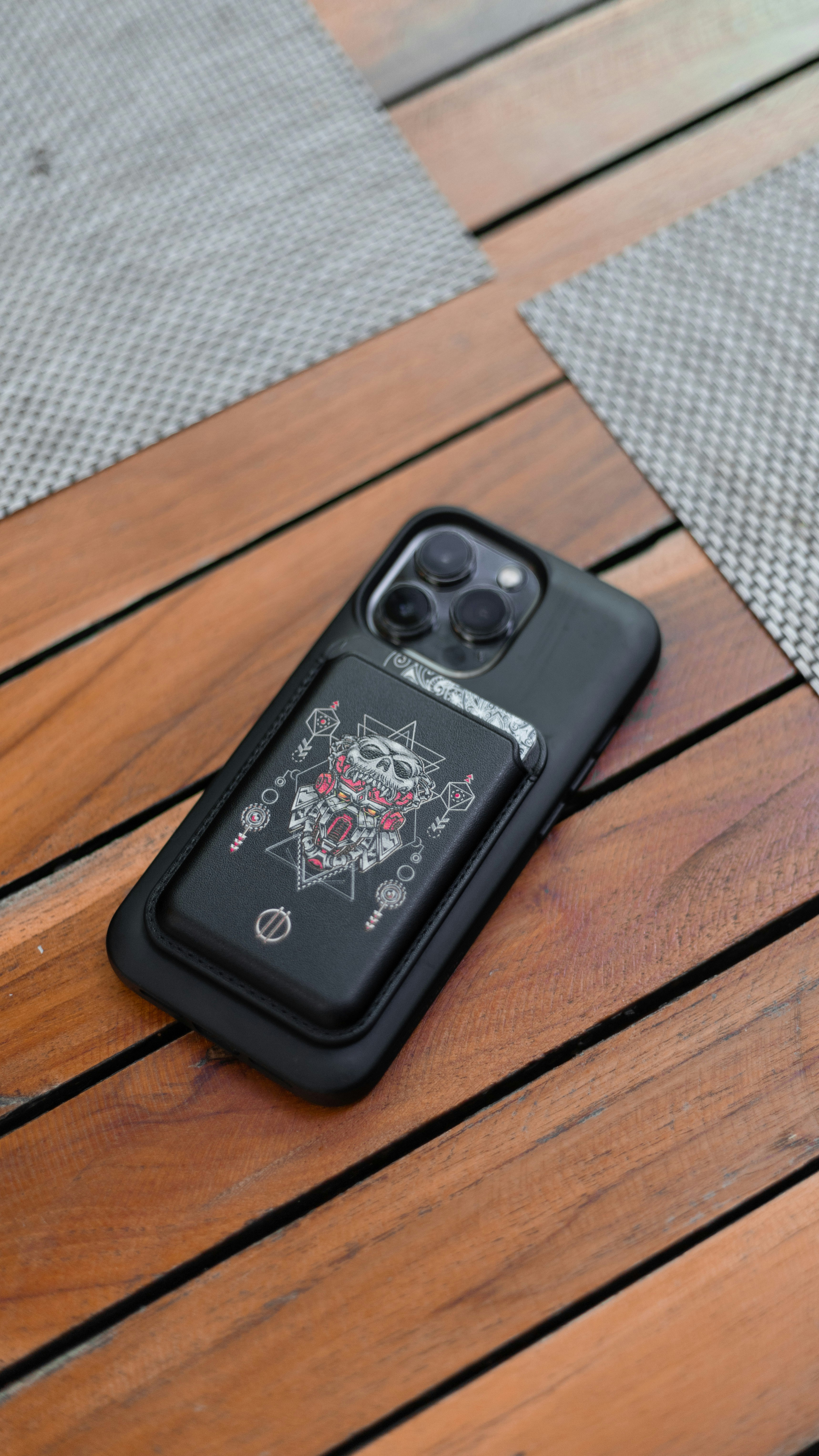 a black case sitting on top of a wooden table